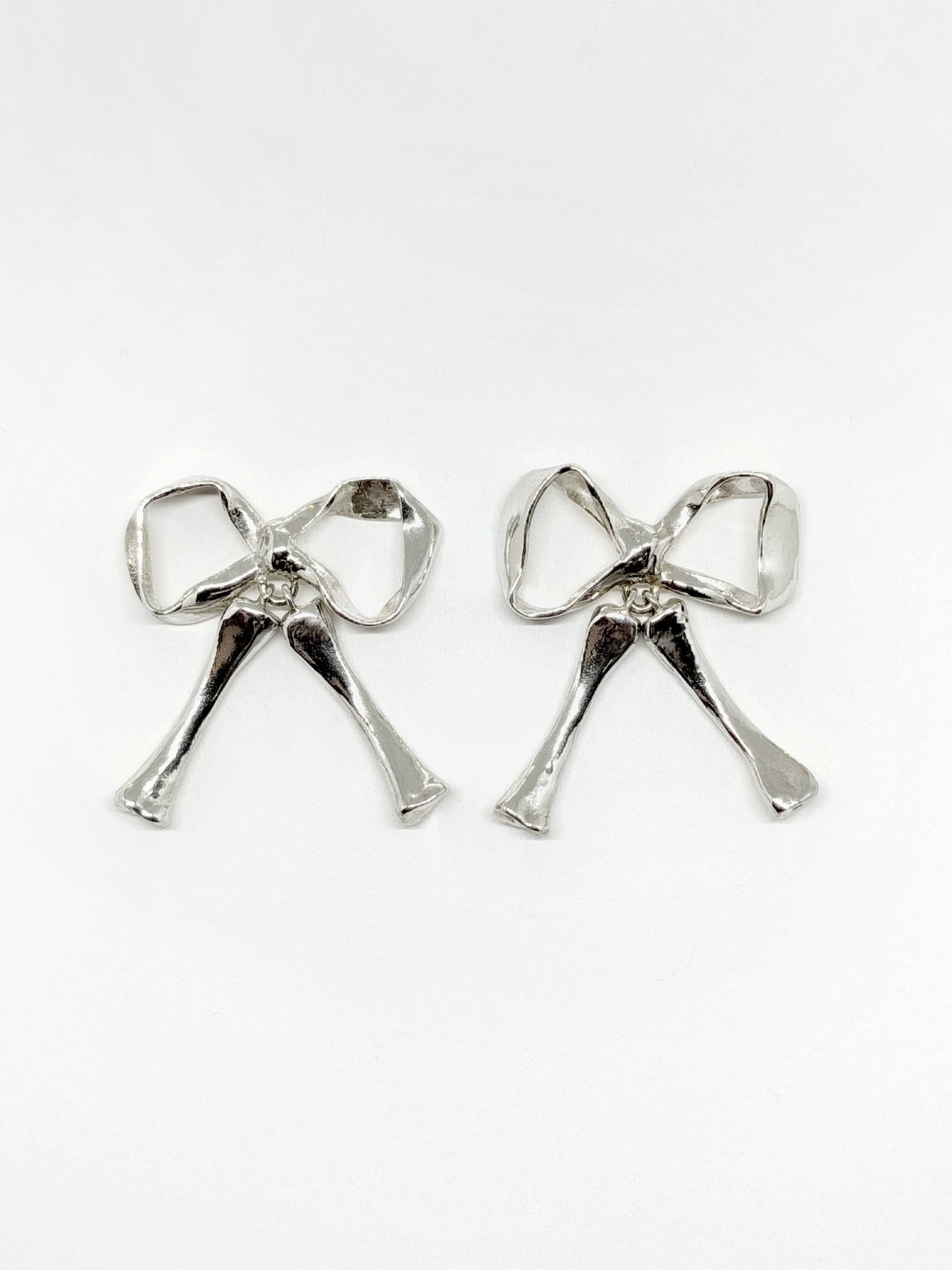 SKELETON BOW EARRINGS