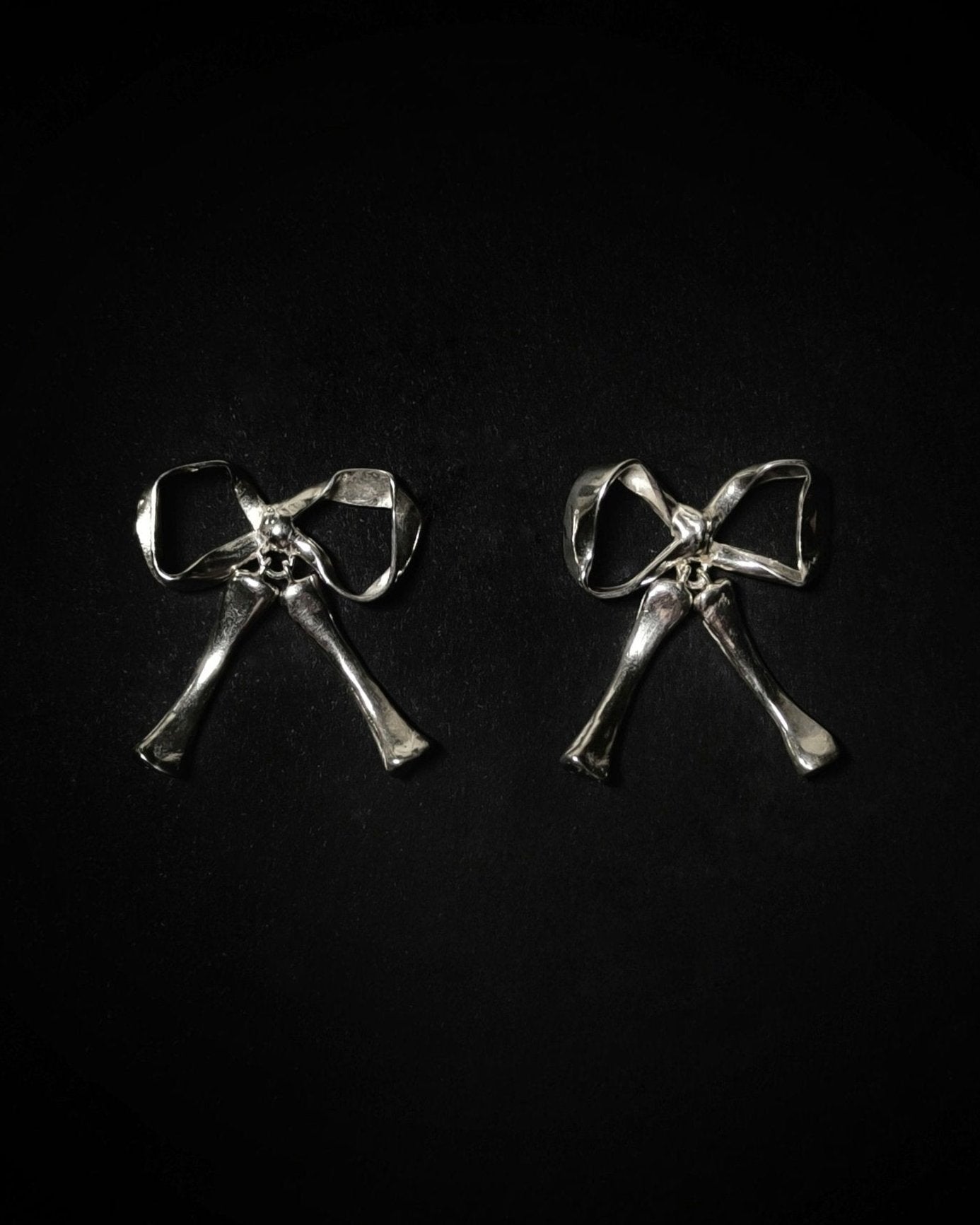 SKELETON BOW EARRINGS