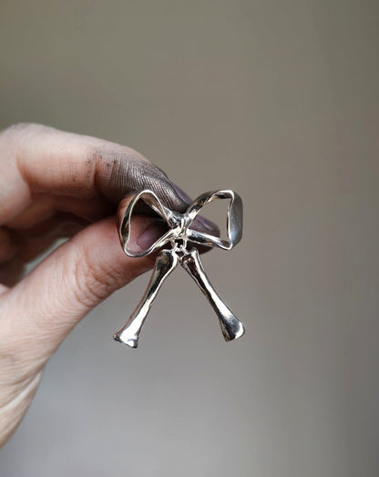 SKELETON BOW EARRINGS